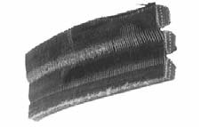 Dos de la bande de liaison effrité, usé ou endommagé